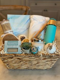 a basket filled with personal care items sitting on top of a kitchen counter next to a sink