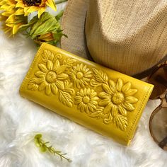 "Timeless women wallets first used in the 60's and 70's as an evolution for women accessories. Labor time: 6 hours All handcrafted one at a time by master leather artisans - 9 credit card slots - One zipper coin pocket - ID window - Two bill compartments - Metal magnetic clasp - 8\" L x 4\" W (20 x 10 cm) Because items are handmade, each leather wallet will respond to coloring slightly different. Other available colors: https://www.salylimonusa.shop/shop/25084790/sunflowers-wallets IMPORTANT: If Leather Wallet Women, Woman Wallet, Fun Wallets, Small Leather Bag, Sunflower Gifts, Small Makeup Bag, Cute Wallets, Sustainable Leather, Phoenix Tattoo