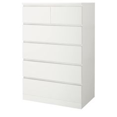 a white dresser with five drawers on it