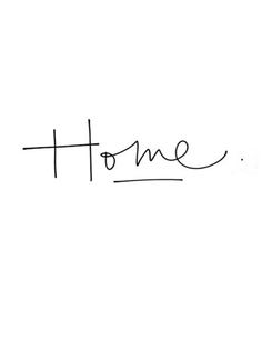 the word home written in cursive handwriting