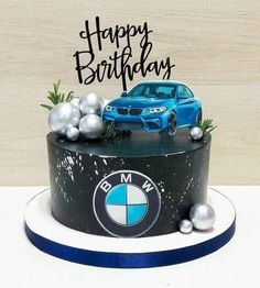 a birthday cake with a bmw car on it