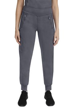 PRICES MAY VARY. CONTEMPORARY DESIGN: Our 9233 Tara Jogger Scrubs pant with 6 Pockets including 2 Zipper Pockets features a contemporary Jogger ankle style and high-performance yoga knit comfort stretch waistband. Inseam Measurements (based on size small): Regular (29), Petites (27"), Tall (31.5") THE WORLD'S BEST FABRIC: Purple Label collection for Women's Scrubs comprises a superior polyester-rayon-spandex stretch fabric blend that is lightweight, soft, and breathable. The Women Scrub Pants ar Jogger Scrubs, Scrubs For Women, Medical Gifts, Healing Hands, Surgical Hats, Fashion Mask, Purple Label, Womens Scrubs, Scrub Pants