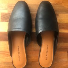 Never Worn. Upper Leather. Black. Size 9. Slip On Mule. Casual Black Flats For Office, Casual Black Office Flats, Trendy Black Slip-on Flats, Casual Business Mules With Leather Footbed, Summer Business Casual Mules, Casual Summer Business Mules, Casual Business Mules For Spring, Casual Business Mules For Summer, Trendy Black Office Flats