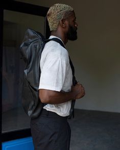 Handcrafted from carefully-selected recycled denim, this lightweight backpack is treated with a wax finish, resulting in a water and dirt resistant outer shell. This statement backpack is equipped with various pockets and convenient access. It is an great companion for everyday use. Please note that all K.J.DAN products are made by hand and produced out of a small family-run factory. Production of custom orders typically require a 2-week turnaround, but may be delayed due to overwhelming orders. Streetwear Backpack With Multiple Pockets, Streetwear Backpack With Pockets, Urban Backpack With Zipper Pocket For Outdoor, Urban Outdoor Backpack With Zipper Pocket, Streetwear Backpack With Functional Pockets, Leather Backpack For Streetwear, Urban Streetwear Backpack With Functional Pockets, Leather Streetwear Standard Backpack, Leather Streetwear Backpack