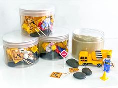 "Perfect for your little construction worker! This construction kit provides hours of imaginative play! Sensory play is crucial for child development, and these kits encourage your child's fine motor skills, language development, and of course, imaginative play! All while having fun! Kit includes: *Construction vehicle (styles may vary) *mini figure *tinkering items *Tinker Sand (molding sand) *Jar approximately: 3 3/4\" wide and 2 3/4\" tall WARNING: CHOKING HAZARD- NOT INTENDED FOR CHILDREN UNDER 3. DO NOT EAT. ADULT SUPERVISION REQUIRED.  SHIPPING: if shipping charges seem high, rest assured that I will refund any shipping overages after your items are shipped out. Feel free to contact me if you have any questions as well" Construction Theme Party Favors, Sand Jar, Paw Patrol Party Favors, Construction Party Favors, Kids Play Dough, Construction Gifts, Kids Construction, Construction Theme Party, Diy Preschool