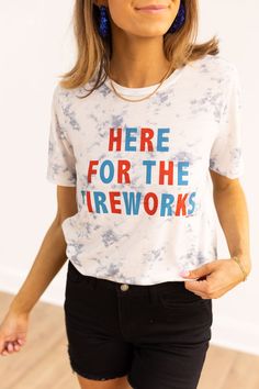 Here for the Fireworks Graphic Tee from the Lady Liberty Collection by Grace and Emma. Whether you're enjoying Independence Day or any festive occasion, let this shirt be your go-to choice for expressing your patriotic spirit with flair. Crafted from soft material, this tee ensures both comfort and style, making it the perfect way to celebrate with elegance and ease.Fit: RelaxMaterial: 65%Cotton 35%PolyesterOur Model is Wearing: Size Small Labor Day Crew Neck Top With Flag Print, Labor Day Flag Print Crew Neck Top, 4th Of July Cotton Slogan Tops, Fun American Flag Print Summer Tops, Patriotic Pre-shrunk Top For 4th Of July, Patriotic Independence Day Tops With Relaxed Fit, Patriotic Tops For Independence Day With Relaxed Fit, Cotton Slogan Tops For 4th Of July, Fun Cotton Tops For 4th Of July