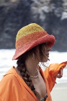 These unique bucket hats were inspired in the landscapes of Peru. Functional, aesthetic and timeless hats made out of organic fique yarn. Hand knitted with love and patience in Curiti, a town of artisans located in the beautiful mountains of Colombia. PRODUCT INFO:  Interior lining Our products are handcrafted sustainably with Fique, an artisanal yarn produced in Colombia, which comes from the Fique plant, endemic from the Andes region. Fique crops are regenerative don't use any pesticides or fertilizers. Orange Cotton Beach Hat, Casual Handwoven Crochet Hat With Curved Brim, Casual Handwoven Brimmed Crochet Hat, Casual Handwoven Wide Brim Bucket Hat, Casual Handwoven Brimmed Hat, Casual Brimmed Handwoven Crochet Hat, Casual Brimmed Crochet Hat Handwoven, Casual Crochet Outdoor Hat, Casual Knitted Yarn Bucket Hat