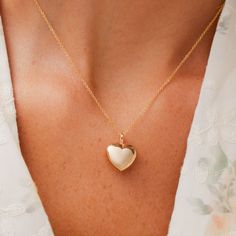 The best gifts come from the heart, and this bubbly, bold charm adds just the right depth to your accessory love story. Featuring a gold-filled puffy heart and delicate chain, this necklace brings fresh dimension to a timeless classic. Everyday Heart Locket Necklace For Valentine's, Elegant Heart-shaped Charm Necklace For Keepsake, 14k Gold Heart Charm Necklace For Wedding, Elegant Heart-shaped Keepsake Charm Necklace, Elegant Charm Necklaces For Valentine's Day Keepsake, Elegant Locket Necklace With Cable Chain For Gifts, Elegant Charm Necklace For Valentine's Day Keepsake, Elegant Valentine's Day Keepsake Charm Necklace, Classic Heart Pendant Charm Necklace For Wedding