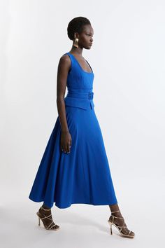 Feel Elegant In Our Midaxi Dress, With A Universally Flattering Silhouette, A Long Skirt That Creates Flowing Movement, And A Squared Neckline That Accentuates The Bust, Perfect For Getting A Little Dressed Up. The Belted Waistline With A Panel Insert Cinches The Silhouette And Elevates The Formality Even Further. Style This Dress With Strappy Heels For An Outfit That Will Turn Heads From Wedding Guest Days To Upcoming Occasions And Events. Structured Crepe Tailored Full Skirted Panel Belted Midi Dress High Quality Crepe Fabric Formal, Flowing Skirt Flattering Fit And Flare Silhouette Squared Neckline Unique Panel Belt At Waist Midi Length Zip Fastening In Back Petite Work Outfits, Petite Wedding Guest Dresses, Squared Neckline, Tall Dresses, Midaxi Dress, Full Skirt Dress, Petite Coat, Outfits Petite, Black Tie Dress