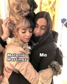 two women hugging each other with the caption melanie martinez me