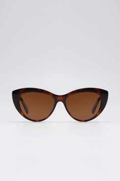 Frame: Tortoiseshell acetate Lenses: Brown Lenses: 54 mm, Bridge: 15 mm, Temples: 148 mm Brown tortoise acetate cat-eye frame with sleek temples, set with brown-tinted lenses that offer good UV protection. Leopard Print Cat Eye Sunglasses With Uv Protection, Polarized Leopard Print Cat Eye Sunglasses, Leopard Print Cat Eye Sunglasses With Gradient Lenses, Acetate Cat Eye Sunglasses With Uv Protection, Brown Acetate Cat Eye Sunglasses With Polarized Lenses, Retro Tortoiseshell Cat Eye Sunglasses With Tinted Lenses, Retro Acetate Cat Eye Sunglasses, Modern Brown Acetate Cat Eye Sunglasses, Tortoiseshell Cat-eye Sunglasses With Gradient Lenses