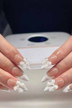 White Nails With Designs Graduation, Bow And Pearl Nails, White Almond Nails With Design Classy, White Almond French Tip Nails, French Nails With Bow, White Bow Nails, Bow Nail Designs, Bow Nail, Long Almond