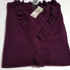 Large Ann Taylor** Cardigan Sweater In The Color Of Eggplant ... 1st Picture Is The Best One For Color. Ruffle Around The V Neck, Down The Front Where The Buttons Are. Long Sleeves. Chest 20.25" Back Length Not Including The Ruffle 22" Flat Lay Measurements Approx Non Smoking/Pet Friendly Home V-neck Ruffled Cardigan For Layering, Elegant Purple Sweater For Fall, Elegant Purple Fall Cardigan, Elegant Purple Winter Cardigan, Casual Ruffled Cardigan For Fall, V-neck Ruffled Winter Cardigan, Elegant V-neck Ruffle Cardigan, Ruffled V-neck Cardigan For Layering, Ruffled V-neck Layering Cardigan