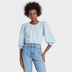 From Weekend Brunches To Casual Dates To Backyard Barbecues, This 3/4-Sleeve Bubble Hem Top From A New Day Makes A Go-To Pick On Any Occasion. Made From Soft Fabric With A Hint Of Spandex For All-Day Breathable Wear, This Casual-Fit Top Features A Pleated Neckline And Elasticized Hem For A Flattering Look, And It Has Balloon-Sleeves That Infuse Some Sophisticated Detail. Showcasing Allover Cool Textured Detailing With Behind-The-Neck Button Closure For Effortless Ease Of Wear, Simply Pair It Wit Blue Trendy Top With 3/4 Sleeves, Light Blue Casual Top With 3/4 Sleeves, Light Blue 3/4 Sleeve Casual Blouse, Casual Light Blue Blouse With 3/4 Sleeves, Light Blue Half Sleeve Tops For Spring, Blue 3/4 Sleeve Tops For Daywear, Pink Plaid Shirt, Bubble Hem, Red Tank Tops