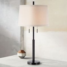 a lamp that is on top of a table