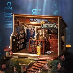 a doll house is set up in the shape of a pirate's hut with lots of items