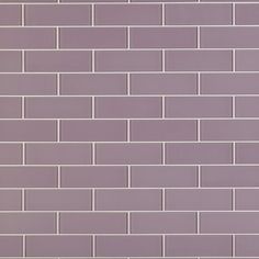 a purple brick wall is shown in this image