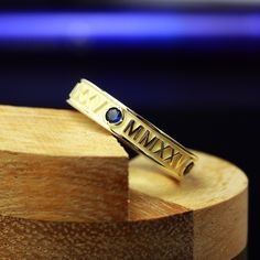 Celebrate your academic journey with our 14K Gold Roman Numeral Class Ring, designed for men and women.  🎓✨ This exquisite piece of jewelry proudly showcases the year 2025 in elegant Roman numerals, school name and your name, preserving your school experiences with classic style.  Ring design have four sparkling gemstones between graduation year . It's more than just a ring; it's a symbol of your achievements and a perfect graduation gift.  🌟💍 Make your graduation unforgettable with this clas Luxury Gold Birthstone Ring For Promise, Luxury Gold Birthstone Promise Ring, Luxury Polished Birthstone Ring For Anniversary, Gold Sterling Silver Sapphire Promise Ring, Gold Sapphire Ring In Sterling Silver For Promise, Formal Gold Engraved Birthstone Ring, Luxury 14k Stamped Sapphire Ring Gift, Luxury Gift Sapphire Ring Stamped 14k, Gold Sapphire Promise Ring With Round Band