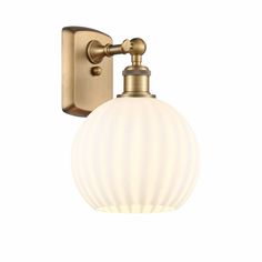 a wall light with a white glass ball on it