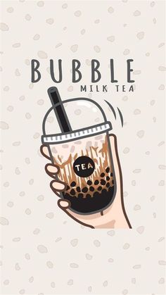 a hand holding a cup with bubble tea in it