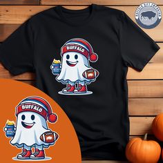 Introducing the Buffalo Football Ghost T-Shirt - perfect for fall or Halloween celebrations! Show off your love for the team and add a touch of festive spirit with this fun and stylish shirt. Get yours today and stand out from the crowd! Made to order. Mascot T-shirt For Fans, Short Sleeve, Sports Fan T-shirt With Mascot For Fan Merchandise, Fan Apparel T-shirt With Mascot, Game Day Fan Apparel T-shirt With Mascot, School Spirit Crew Neck T-shirt For Tailgating, School Spirit T-shirt For Tailgating With Crew Neck, School Spirit T-shirt For Tailgating, Team Spirit Short Sleeve T-shirt For Tailgating, Team Spirit T-shirt With Mascot