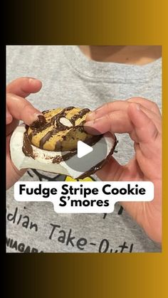 a person is holding a fake cookie in their hand with the caption fudge stripe cookie s'mores