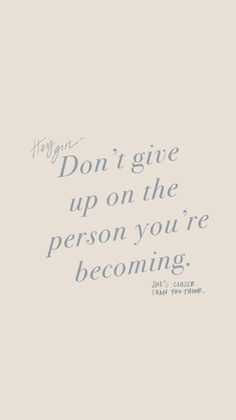 a white and blue quote with the words don't give up on the person you're becoming