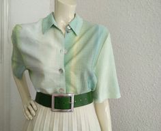 90s gradient green blouse, vacation summer blouse, ombre colors blouse, button up shirt, relax fit blouse, wrinkled blouse, elegant summer blouse, no label size, no label composition. Measurements laying flat : shoulders :39 cm (15,5 inches) bust :57cm (22,5 inches) total lenght :82 cm (32,5 inches) sleeve lenght :32 cm (12,5 inches) Green Button-up Blouse For Summer, Elegant Green Summer Shirt, Vintage Green Shirt For Summer, Vintage Green Summer Shirt, Green Summer Button-up Blouse, Green Button-up Summer Blouse, Blouse Elegant, Summer Blouse, Fitted Blouses