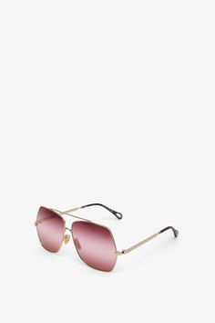 Gold and gradient pink sunglasses from Chloé. The Aly modern aviator sunglasses feature square frames in shiny gold metal set with triple gradient lenses in a palette of burgundy, pink and red. The Chloé logo finishes the left lens.100% UVA and UVB protectionFilter category: 1Not prescription friendlyLens: 62 mmBridge: 12 mmTemple: 140 mmMade in Italy Cheap Modern Gold Sunglasses, Cute Gold Sunglasses, Pink Preppy Sunglasses, Valentino Sunglasses Women 2022, Pink Burberry Sunglasses, Chloe Logo, Pink Sunglasses, Pink And Red, Square Frames