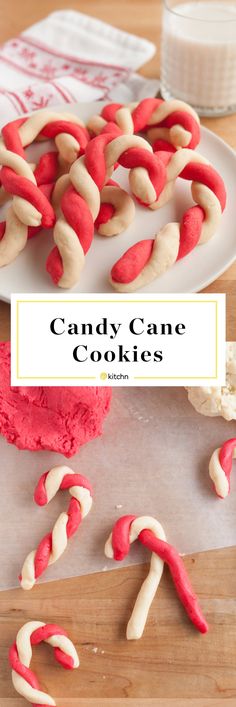 candy cane cookies on a white plate with red icing