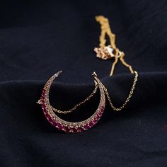 "Solid 14k Yellow Gold Precious Ruby Gemstone Pave Diamond Designer Crescent Moon Pendant Chain Necklace Jewelry Gift For Her NEMJ-632 14k Gold Pendant Necklace. Pave Diamond Pendant. Precious Ruby Gemstone Jewelry. 14k Yellow Gold Jewelry. Chain Necklace Jewelry. Crescent Moon Pendant For Gift. Gift For Her. 25x25 MM Pendant Size / 16\" Chain (2\" Adjustable Included) Here Are Some Amazing Ways To Take Care Of Your Precious Diamond Jewelry. Always. * Apply lotion, cosmetics, hairspray, and perf Fine Jewelry Crescent Gemstone Piece, Fine Jewelry Crescent Gemstone, Yellow Gold Moon-shaped Gemstone Jewelry, Yellow Gold Moon Shaped Gemstone Jewelry, Elegant Half Moon Necklace With Adjustable Chain, Luxury Moon Shaped Jewelry For Formal Occasions, Fine Jewelry Crescent Moon Charm Necklace, Gold Crescent Gemstone Jewelry, Luxury Moon Shaped Necklace For Gift