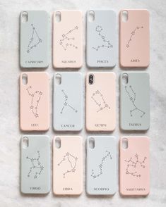 six phone cases with zodiac signs on them, all in pastel pink and white