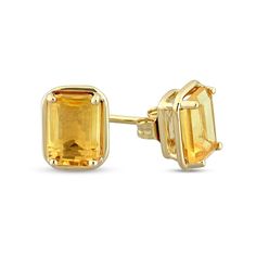 Show your lively personality with the vibrant colour of these emerald-cut yellow citrine outline frame stud earrings in yellow gold. Crafted in 14K gold Each earring showcases a 7.0 x 5.0mm emerald-cut golden yellow citrine glistening inside a polished frame. Citrine is the traditional birthstone for November and is said to bring hope, health and fidelity. These post earrings secure comfortably with friction backs.