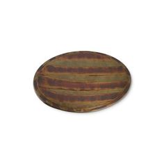 an oval wooden tray with stripes on it