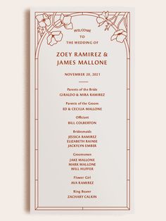 a wedding program card with flowers on it