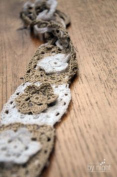 an image of a crocheted tie on the table