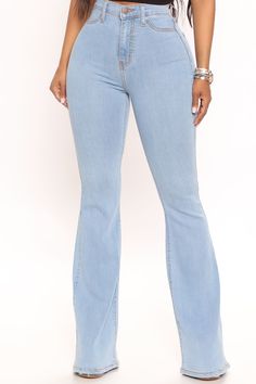 Our sexiest flare jean is offered in a range of washes in a high stretch, super soft fabric that hugs every curve. Fitted in the hips and thighs while flaring at the knee, these jeans elongate the legs and are perfect with a heel. Now offered in a range of washes, colors, and inseams. Available In Black, Dark Denim, Medium Blue Wash, Light Blue Wash, White, Brown, And Olive. Petite 31" Inseam, Regular 34" Inseam, And Tall 37" Inseam 11.5" High Rise High Stretch Denim 22" Flare Leg Opening Faux F Tomboy Outfits, Denim Flares, Dark Denim, Medium Blue, Jeans Style, Flare Jeans, Bell Bottom Jeans, Stretch Denim, Fit And Flare