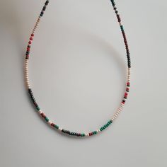 tribal necklacetribal chokercolorful necklacedainty necklaceminimalist necklacenecklace for womenlayering necklace bohemian necklaceseed bead necklaceshort necklace This tribal necklace consists of red seed beads brown seed beads green small bright green toned glass beads . Each dainty  necklace has an extension chain of approximately 1 inch. This colorful necklace layering necklace is 24K Gold Plated Extension Chain, 24K Gold Plated I used lobster claw, stainless steel jewelry wire.waterproof n Seed Bead Necklace, Colourful Necklace, Bright Green, Minimalist Necklace, Stainless Steel Jewelry, Green Bead, Dainty Necklace, Layered Necklaces, Seed Beads