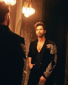 Shahid Kapoor on Instagram: "ROAR Shot by: @mayank_mudnaney Makeup: @james_gladwin_ Makeup assistant: @mahendra.kanojia Hair by: @aalimhakim Hair assistant: @shahrukhshaikh9519 Outfit: @gauravguptaofficial Style by: @theanisha Dressman: @thebombaydressman Managed by: @chanchal_dsouza Digital agency: @59thparallel Security: @parvez_pzee" Black Tuxedo Suit, Designer Blazers For Men, Party Outfit Men, Groom Dress Men, Wedding Dresses Men Indian, Blazer Outfits Men, Gents Kurta, Indian Men Fashion