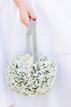 someone is holding a bouquet of flowers in their hand and the text reads, articles from style me pretty get more pins