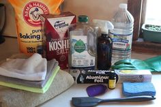 cleaning supplies are sitting on a counter top