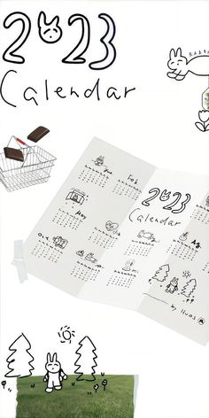 an image of a calendar with doodles on the pages and numbers in it,