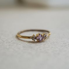 Pink Sapphire Blush Ring Dainty 14k Gold Amethyst Ring, Dainty Gemstone Cluster Ring, Dainty Sapphire Ring With Rose Cut Diamonds For Promise, Dainty Sapphire Ring With Diamond, Dainty Pink Sapphire Promise Ring, Gold Rings With Diamond Accents And Pink Sapphire, Dainty Pink Diamond Ring, Lavender Palette, Pinkish Purple