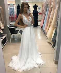 V-neck Evening Dress With Lace Back For Wedding, Chiffon V-neck Gown For Banquet, White V-neck Wedding Dress With Sweep Train, V-neck Wedding Dress With Sweep Train For Banquet, White V-neck Wedding Dress With Lace Bodice, V-neck Wedding Evening Dress With Lace Back, Chiffon V-neck Evening Dress For Prom, White V-neck Gown With Lace Bodice, V-neck Chiffon Gown For Banquet