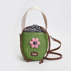 Tagi Blooming Woven Bucket Bag Forest Size F: 20cm * 16cm Shoulder Strap Length 110cm Precautions: Keep away from direct sunlight, heat and moisture. No contact with heavy rains outside. Spring Travel Bag Portable, Spring Travel Portable Shoulder Bag, Portable Spring Travel Bag, Rectangular Travel Pouch For Summer, Spring Travel Bag, Casual Travel Pouch For Spring, Summer Travel Shoulder Pouch, Green Summer Straw Pouch Bag, Summer Travel Pouch With Removable Pouch