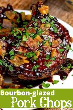 bourbon glazed pork chops on a white plate