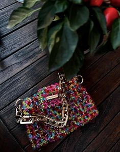 A beautiful beaded handbag made of multi-colored beads will complement your look. The handbag is very neatly made and roomy. Top lid with magnetic clasp. The handle of the handbag is removable. This model is SUITABLE: 🫶🏻 -flat - car key identifier - driver's license - headphones/AirPods - card owner - money lipstick - antiseptic Dimensions - Width: (18 cm) - Height: (12 cm) - Depth: (12 cm) - Handle height 40 cm PRODUCTION AND DELIVERY: All our products are handmade on request from the highest Trendy Multicolor Beaded Shoulder Bag, Trendy Multicolor Beaded Bags, Multicolor Beaded Handheld Shoulder Bag, Multicolor Beaded Evening Bag, Handmade Multicolor Crochet Clutch Bag, Multicolor Beaded Rectangular Evening Bag, Multicolor Rectangular Evening Bag, Trendy Multicolor Clutch Evening Bag, Multicolor Beaded Pouch Evening Bag