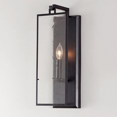 an outdoor wall light with two lights on it