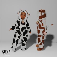 two children in animal onesuits standing next to each other on a white background