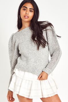 Our Rosie pullover is an instant favorite. Made from baby alpaca, this style is extremely light and fluffy whilst maintaining a chunky look. The pullover features a straight rib neckline and straight body with rib finishing. Added drama in the sleeves contrasts against the body, with an open-knit weave and puff in the shoulder that slims out towards the bottom. Pair it with one of our Ruffle Mini Skirts. Ruffle Mini Skirt, Knitting Women Sweater, Ribbed Neckline, Sweater Sale, Inspiration Style, Women Pullover, Dream Clothes, Black Sweaters, Pullover Sweaters